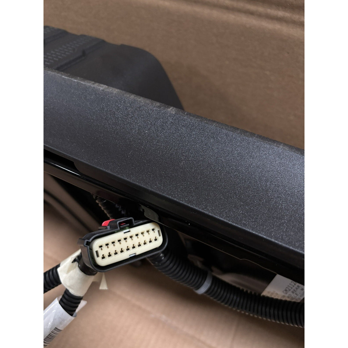 Black Chevrolet Silverado HD rear bumper assembly with sensors — original detail photo 4