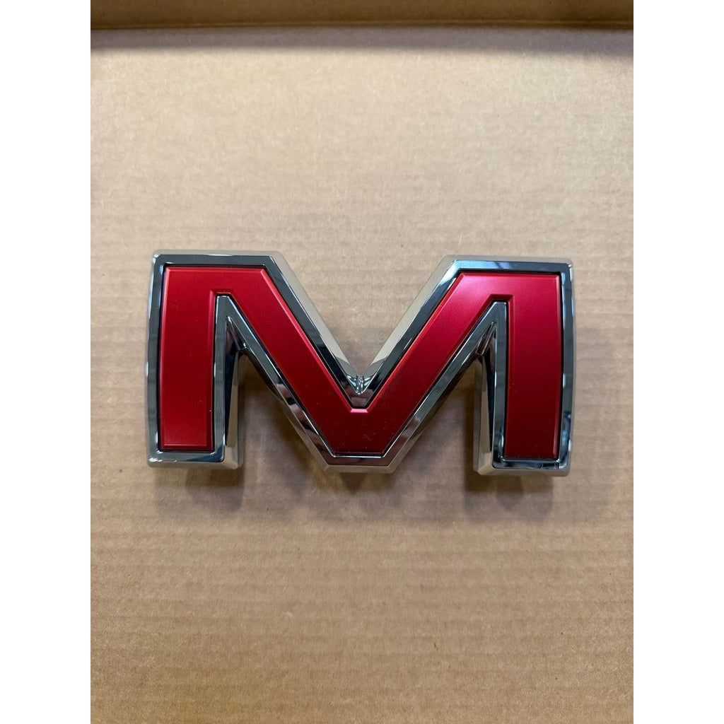 2019-2026 GMC Sierra 1500 Front Grille Emblem "M" OEM New GM 87815669