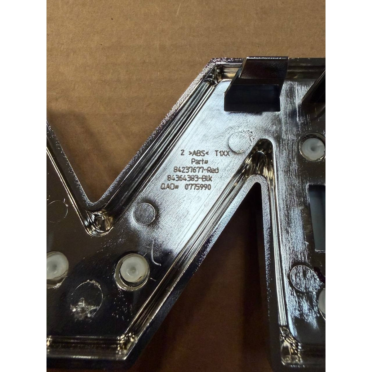 2019-2026 GMC Sierra 1500 Front Grille Emblem "M" OEM New GM 87815669