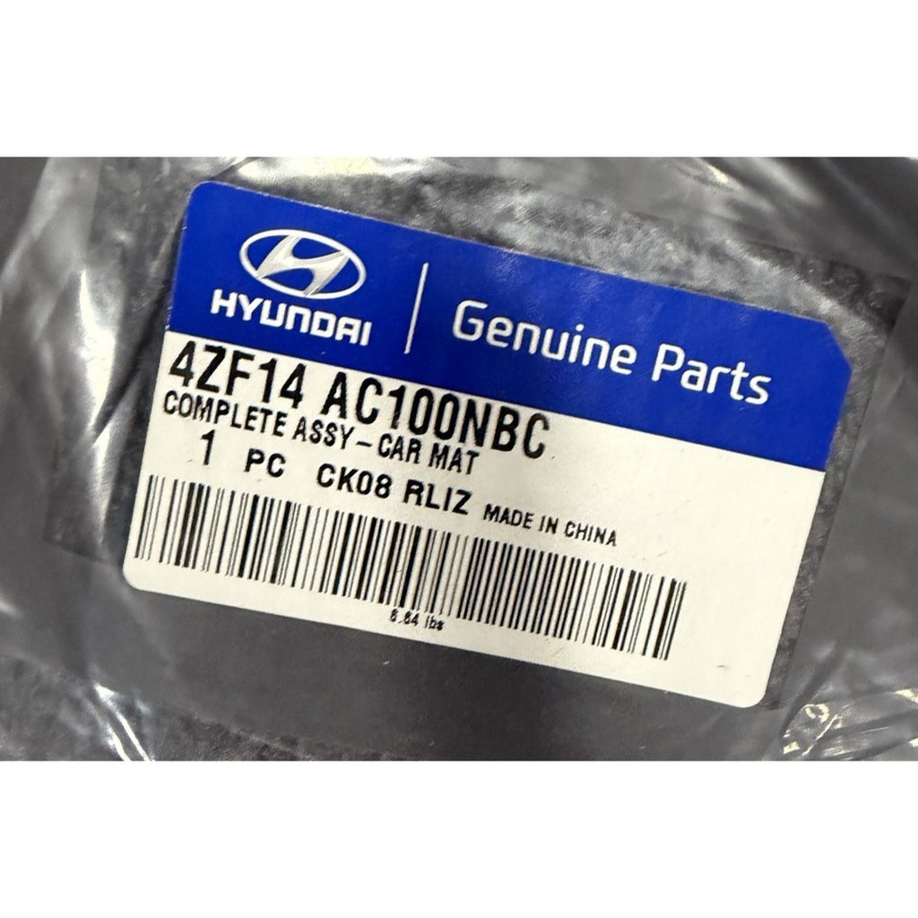Original Hyundai floor-mat packaging label showing part number 4ZF14 AC100NBC