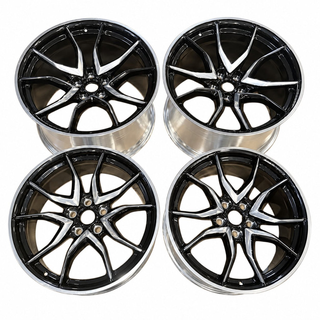Complete set of four GM Corvette forged wheels in black with machined silver faces; two front and two rear