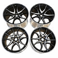 Complete set of four GM Corvette forged wheels in black with machined silver faces; two front and two rear