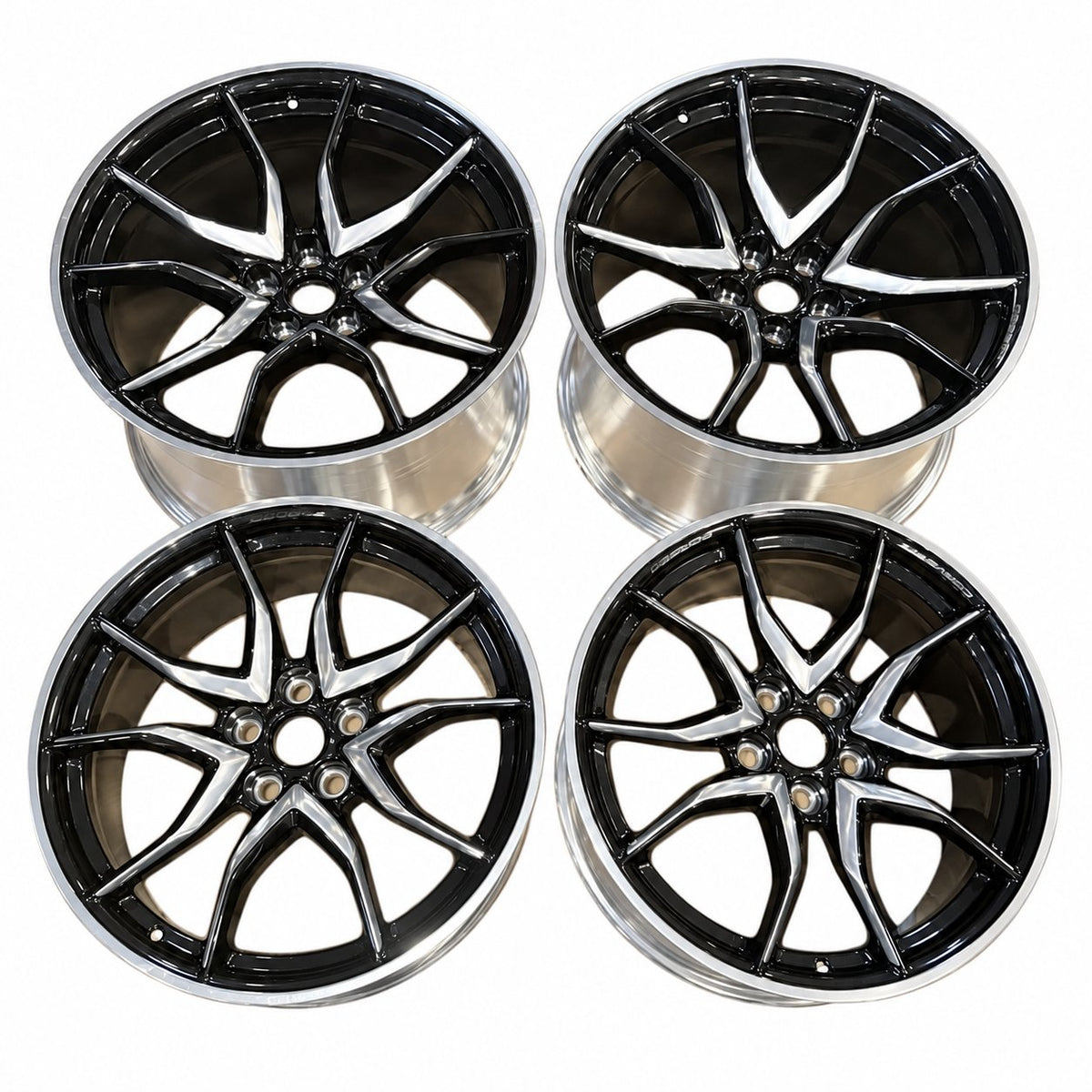 Complete set of four GM Corvette forged wheels in black with machined silver faces; two front and two rear