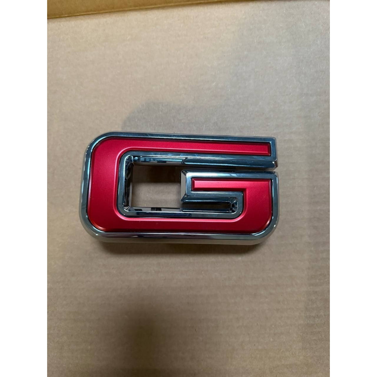 2019-2026 GMC Sierra 1500 Front Grille Emblem "G" OEM New | 84237676