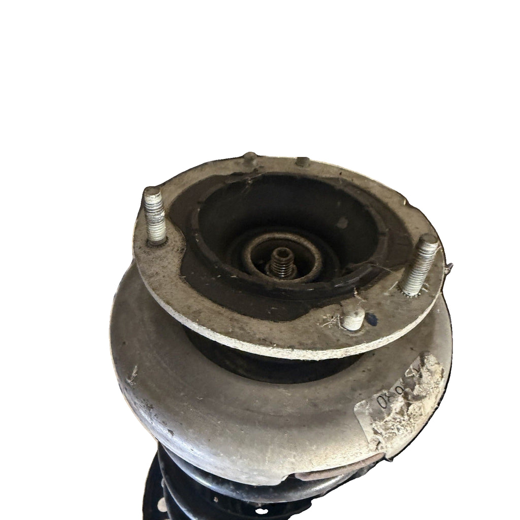 Camaro front strut upper mount and mounting studs close-up