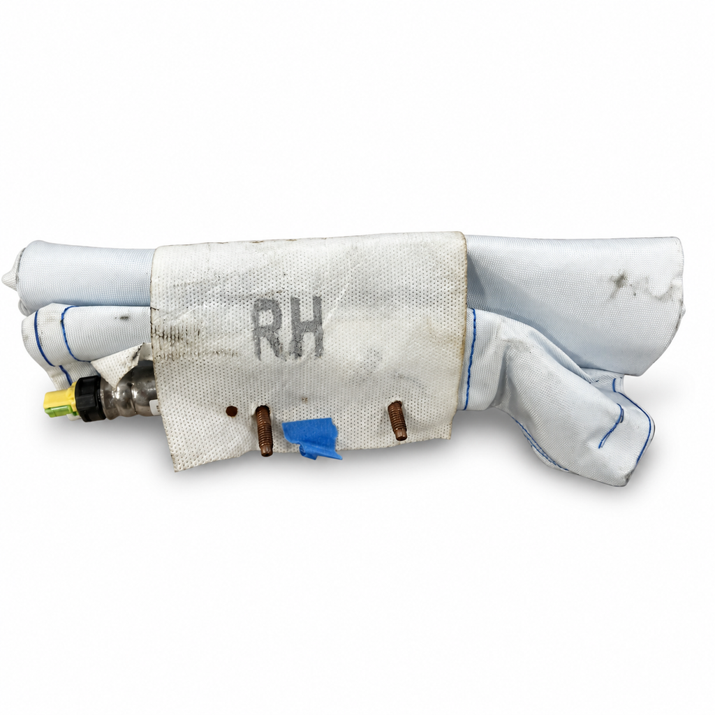 Tesla RH seat airbag actual stock; original label close-up retained in gallery