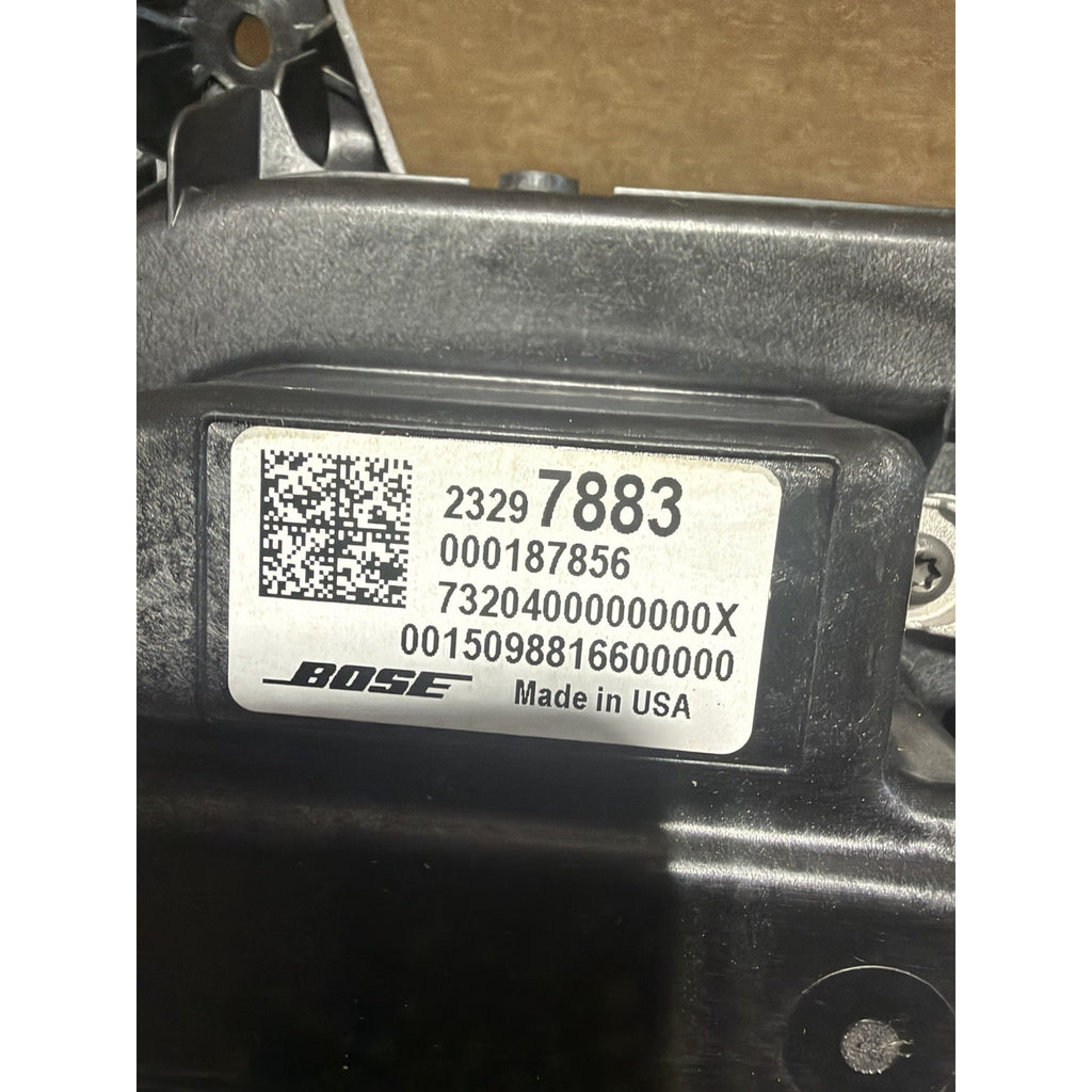 Original Bose subwoofer identification label showing part number 23297883 and Made in USA